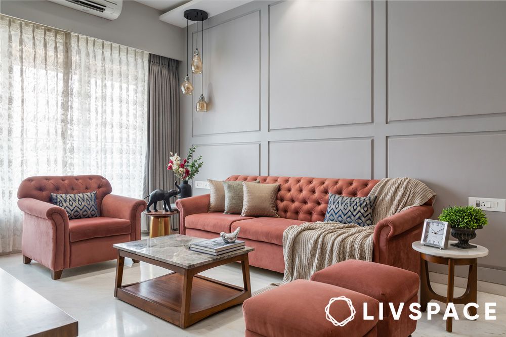 pink-sofa-set-with-accent-chairs-in-a-grey-living-room