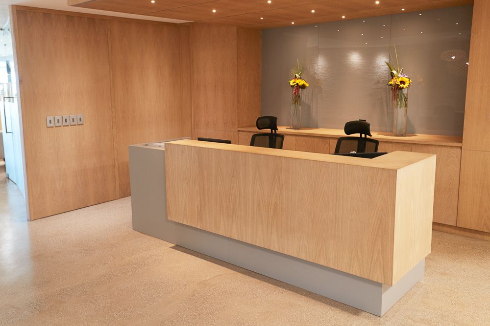 office-reception-area-in-light-wood-with-spotlights