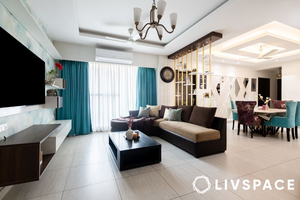 living-room-with-partition-chandelier-tv-unit-texture-paint