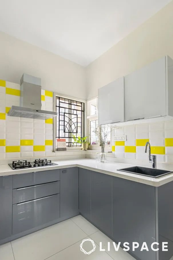 white-and-yellow-kitchen-with-grey-base-cabinets