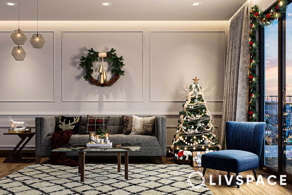 https://jumanji.livspace-cdn.com/magazine/wp-content/uploads/sites/2/2023/12/13101748/modern-living-room-christmas-decoration.jpg