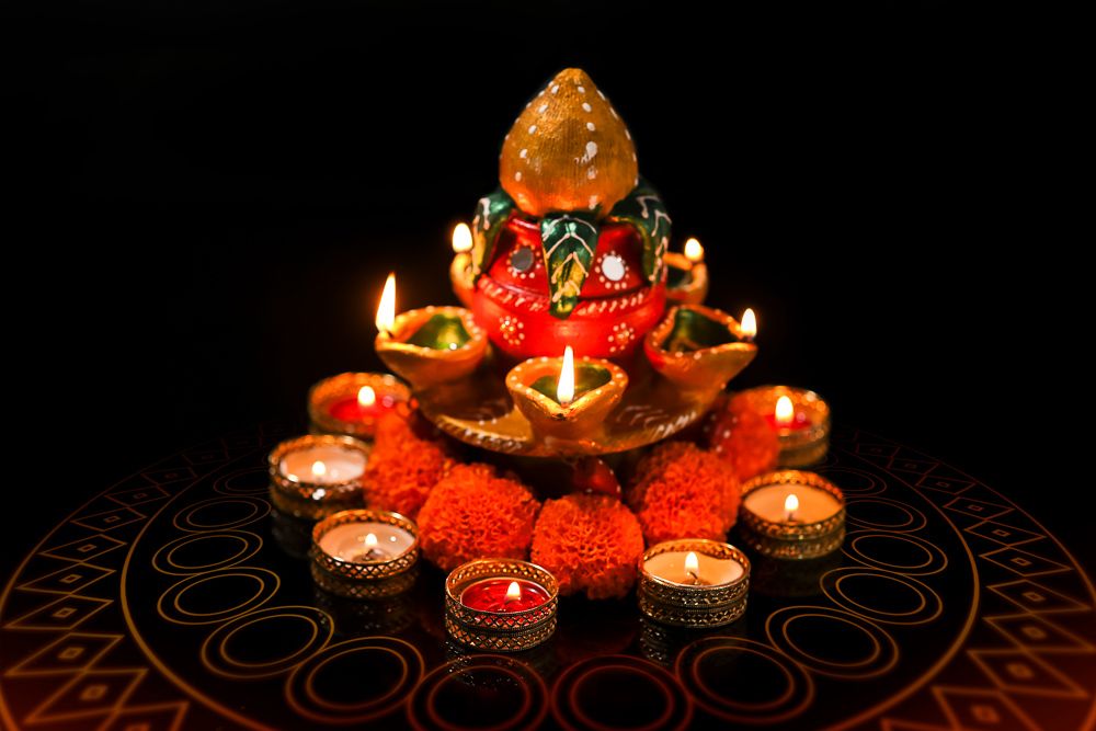 tea candles and flower decoration at home for pooja