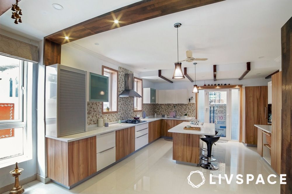 white-wood-kitchen-design-with-dining-area
