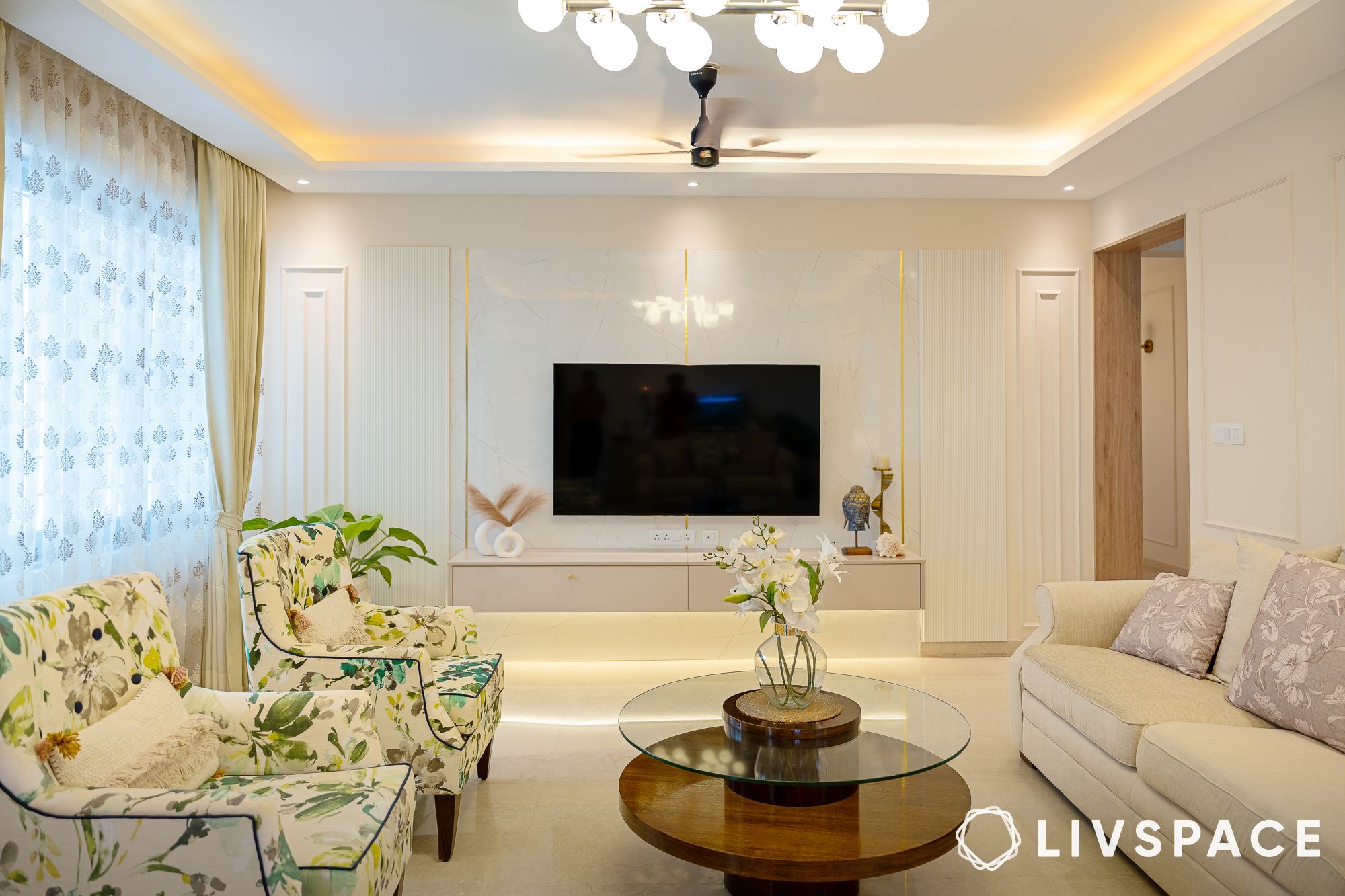 entertainment-zone-with-tv-unit-and-upholstered-chairs