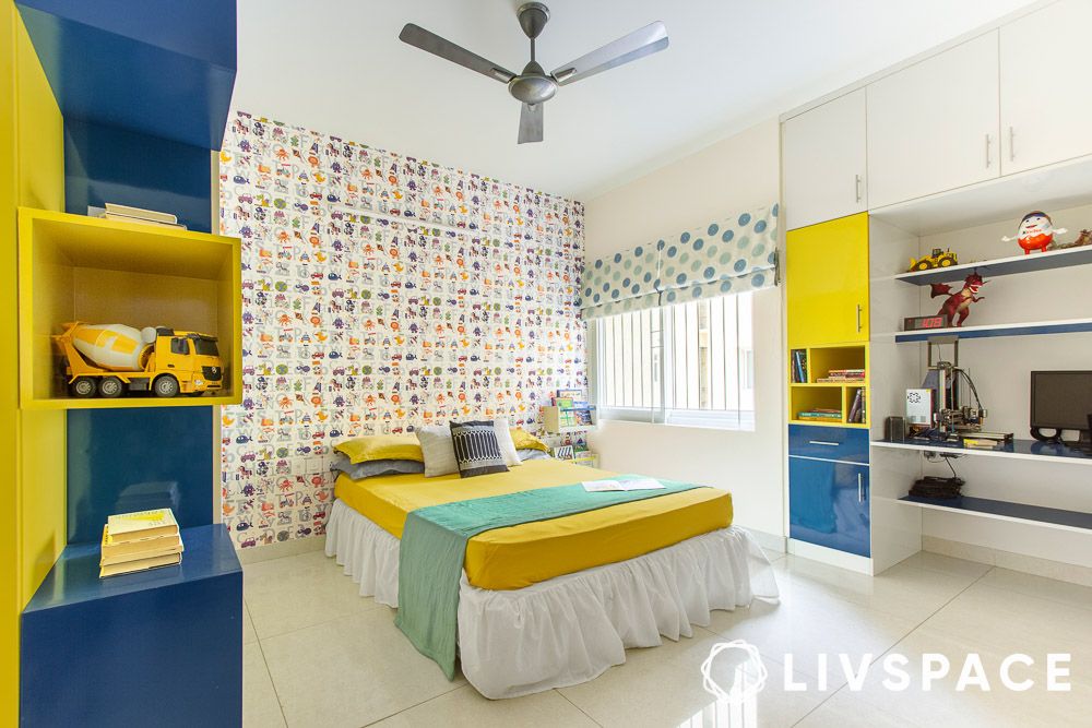 kids bedroom with fun wallpaper