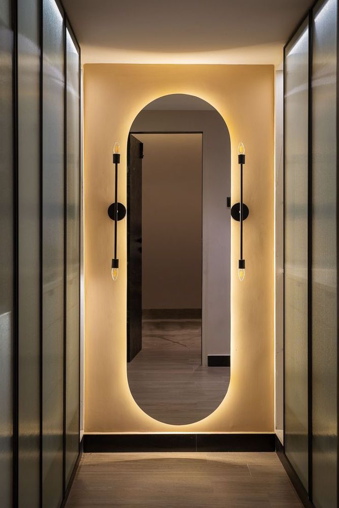 oval-mirror-with-black-fittings
