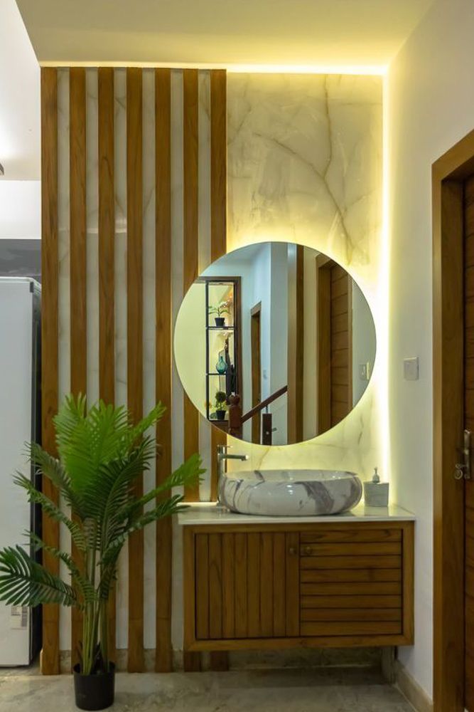 warm-backlit-mirror-design-with-wooden-trellis