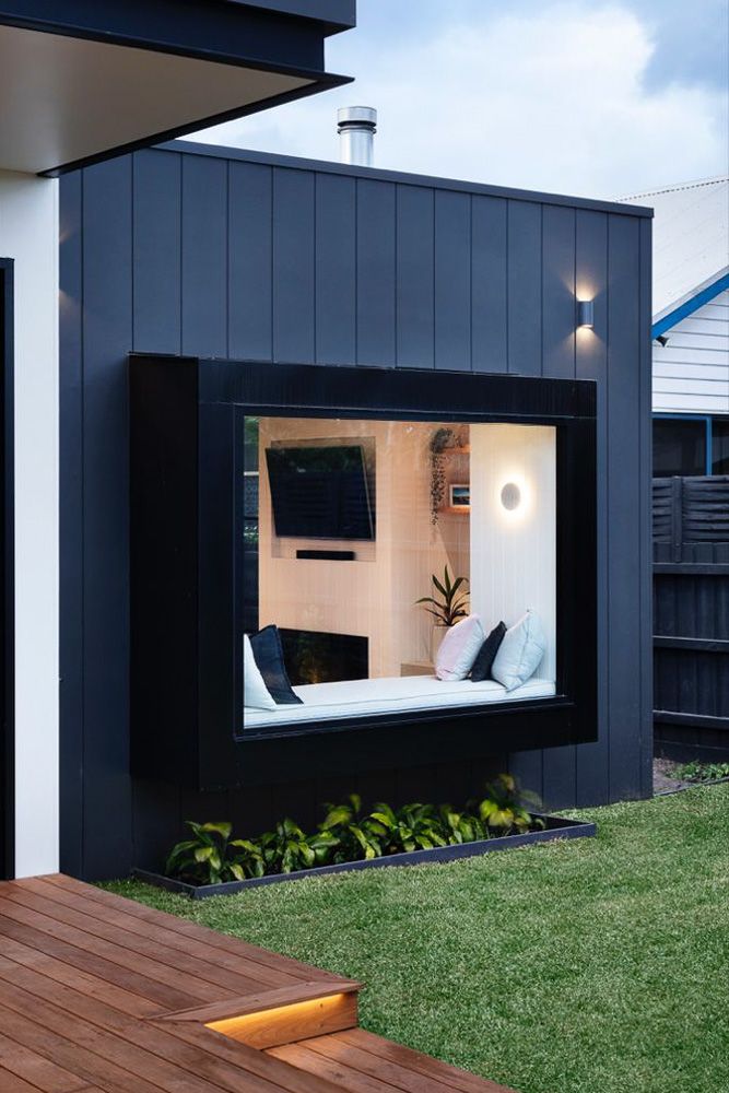 built-in-window-seat-on-a-glass-bay-window