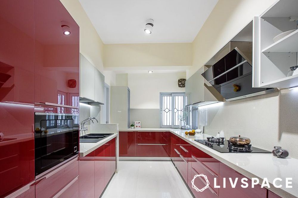 vitrified-tiles-vs-ceramic-tiles-in-red-kitchen