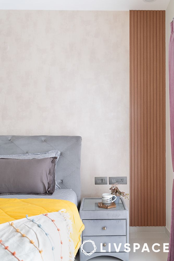 fluted panel in a bedroom with grey bedside table