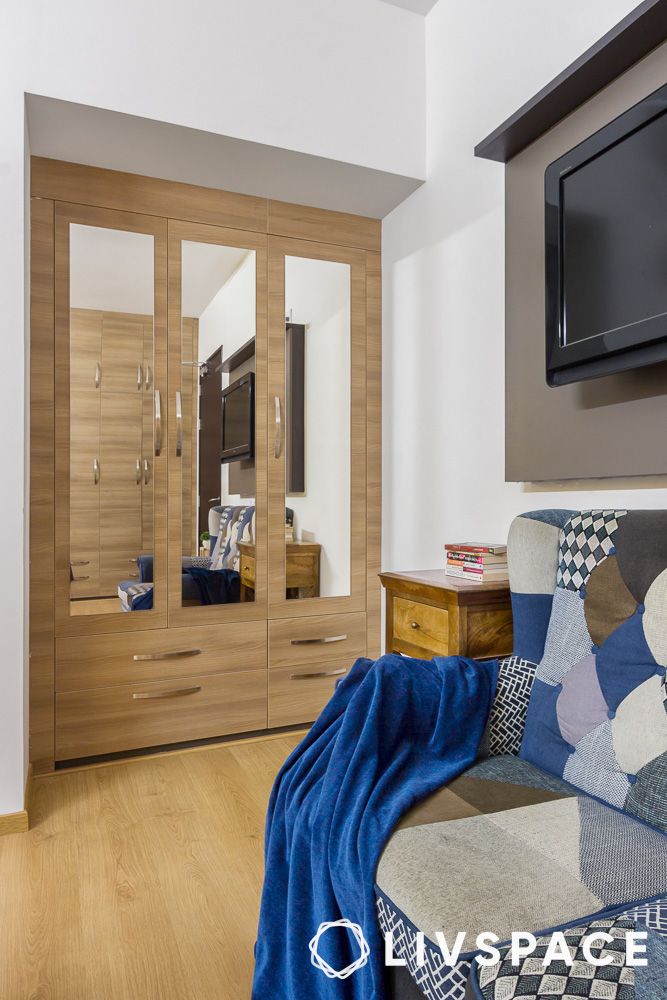 light-wood-swing-wardrobe-with-mirrors-and-drawers