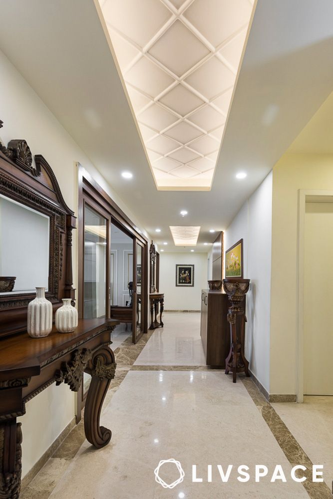 white-granite-flooring-in-hallway-with-lighting
