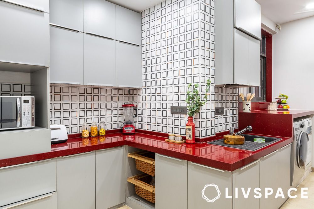 red kitchen counter with square wall design