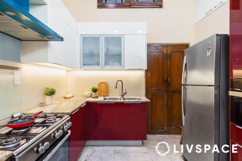 double sink kitchen design with red base cabinets