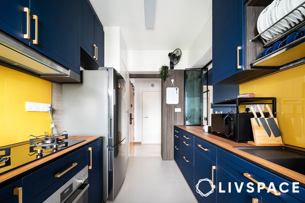 dark blue cabinets with brass handle