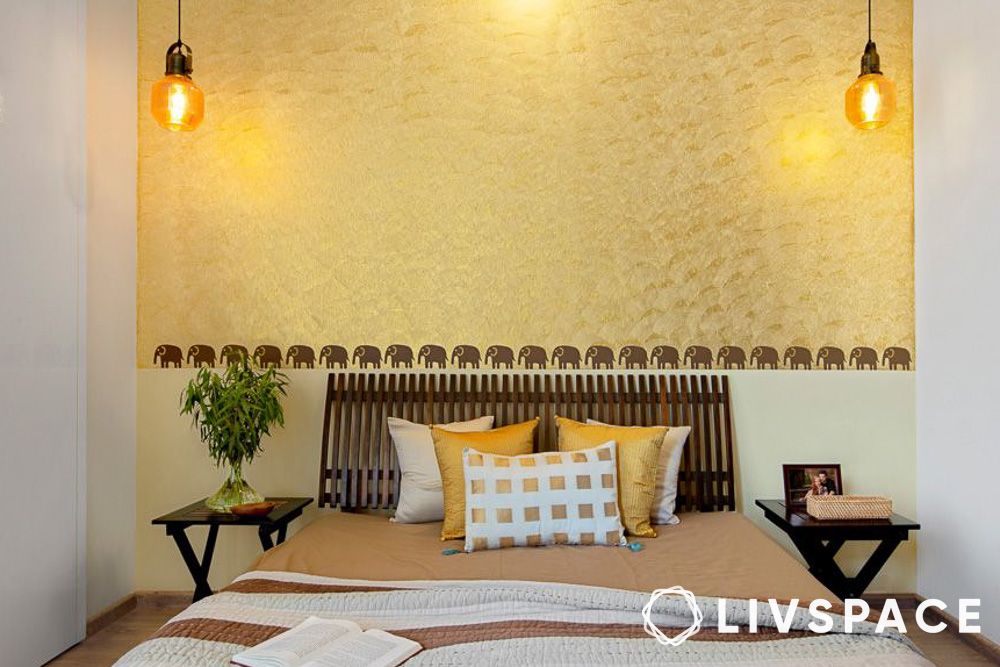 yellow bedroom with traditional wallpaper