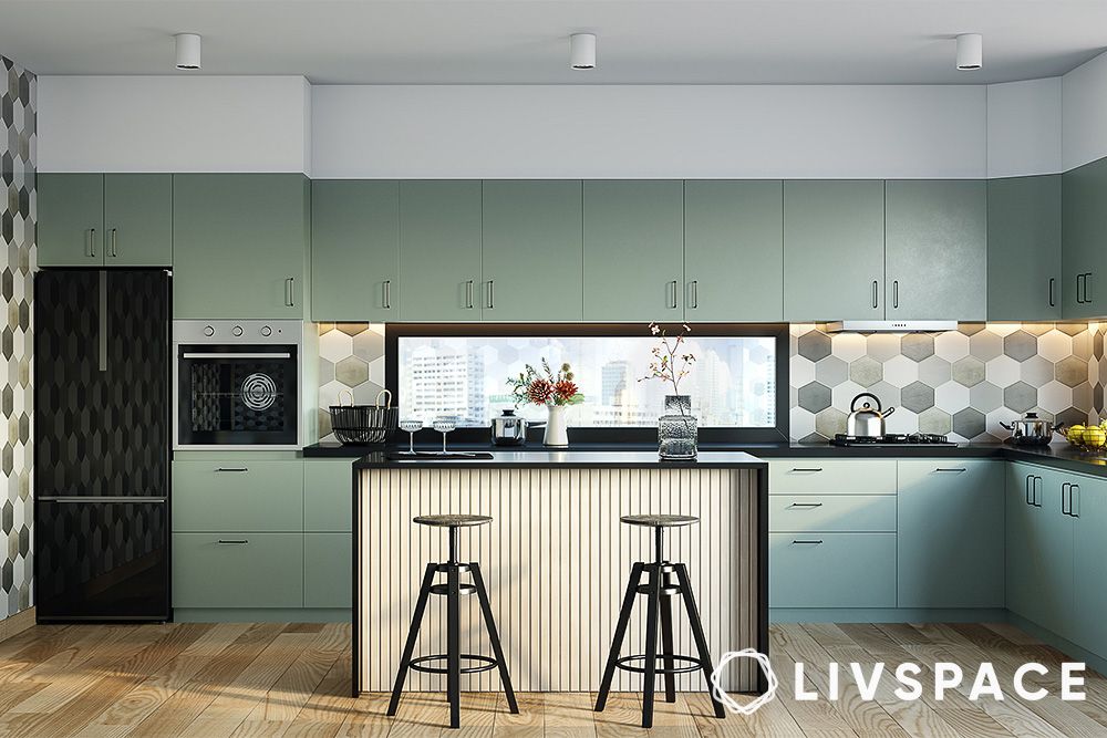 bar stools in a modern sage green kitchen