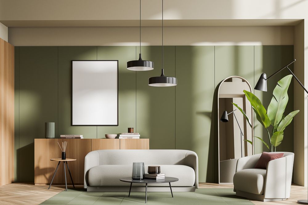 grey-sofa-and-warm-sage-green-wall-in-a-living-room