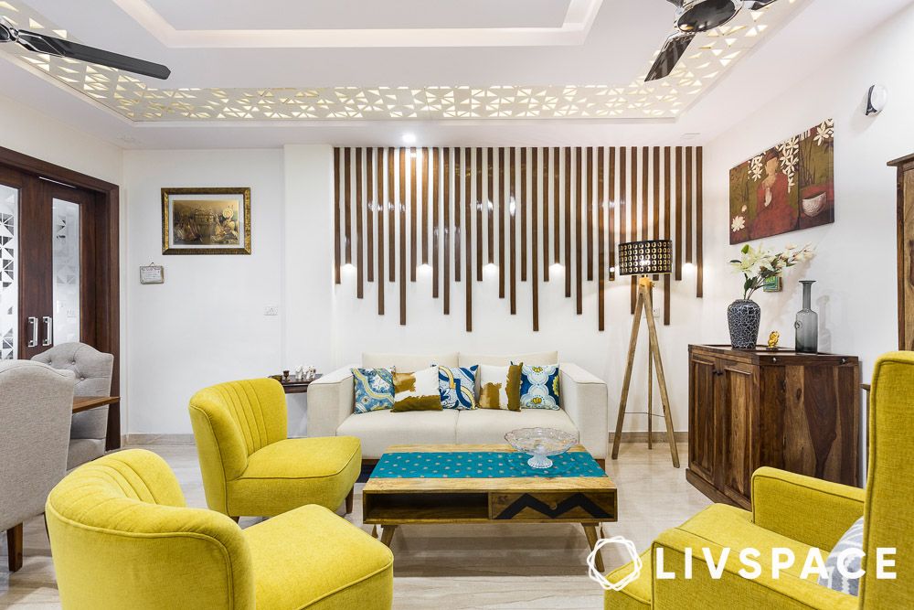 low cost small house design living room with unique false ceiling and wall treatments
