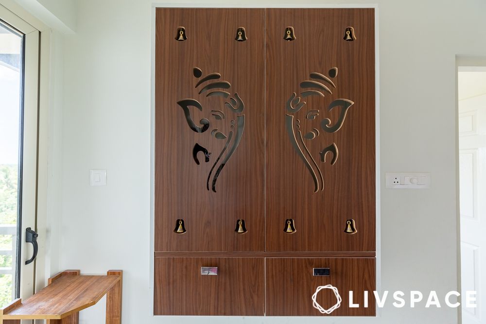 compact wooden pooja room