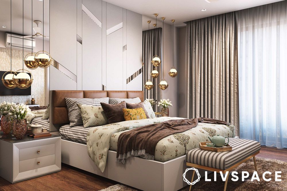 luxury house interior with a bedroom wall made of mirror panels