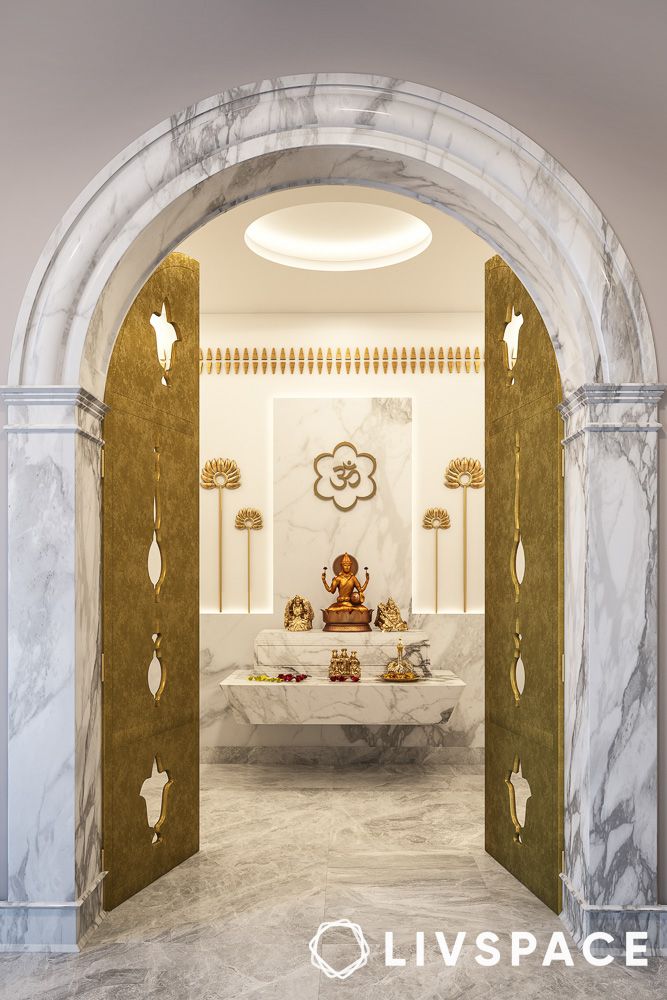 luxury pooja room interior design with marble arch
