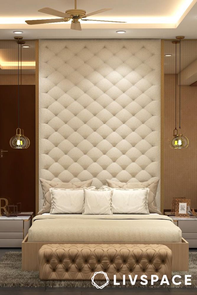 luxury interior bedroom with tufted headboard wall