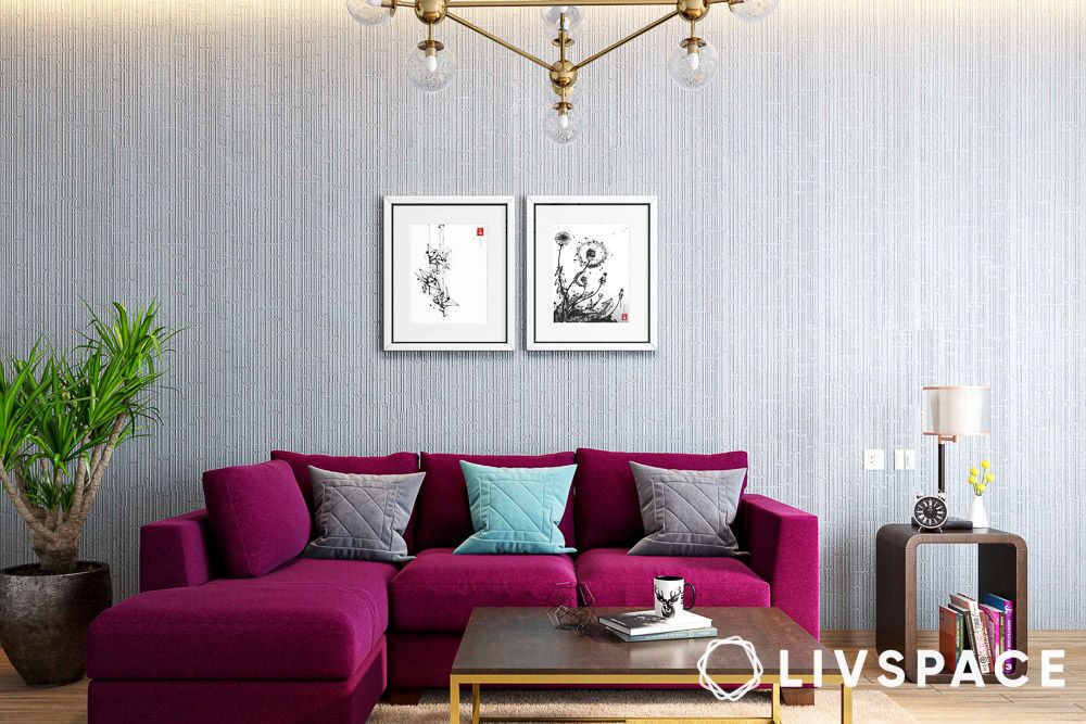 white on white textured wallpaper with maroon couch