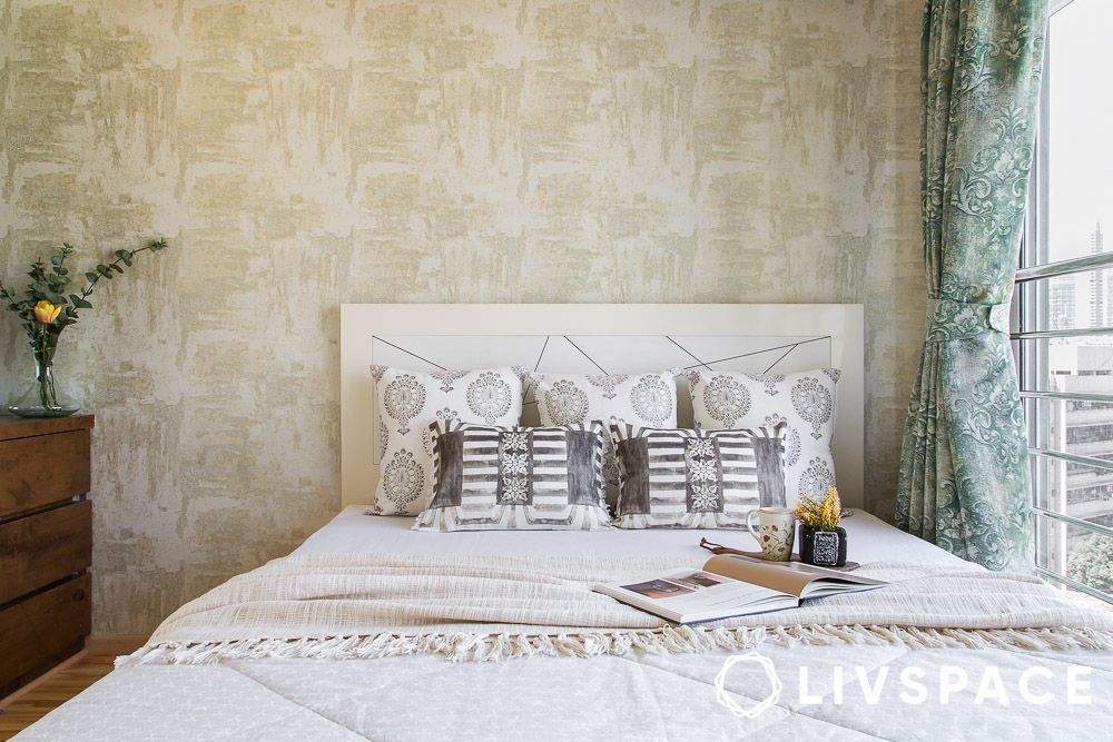 cream textured wallpaper in bedroom