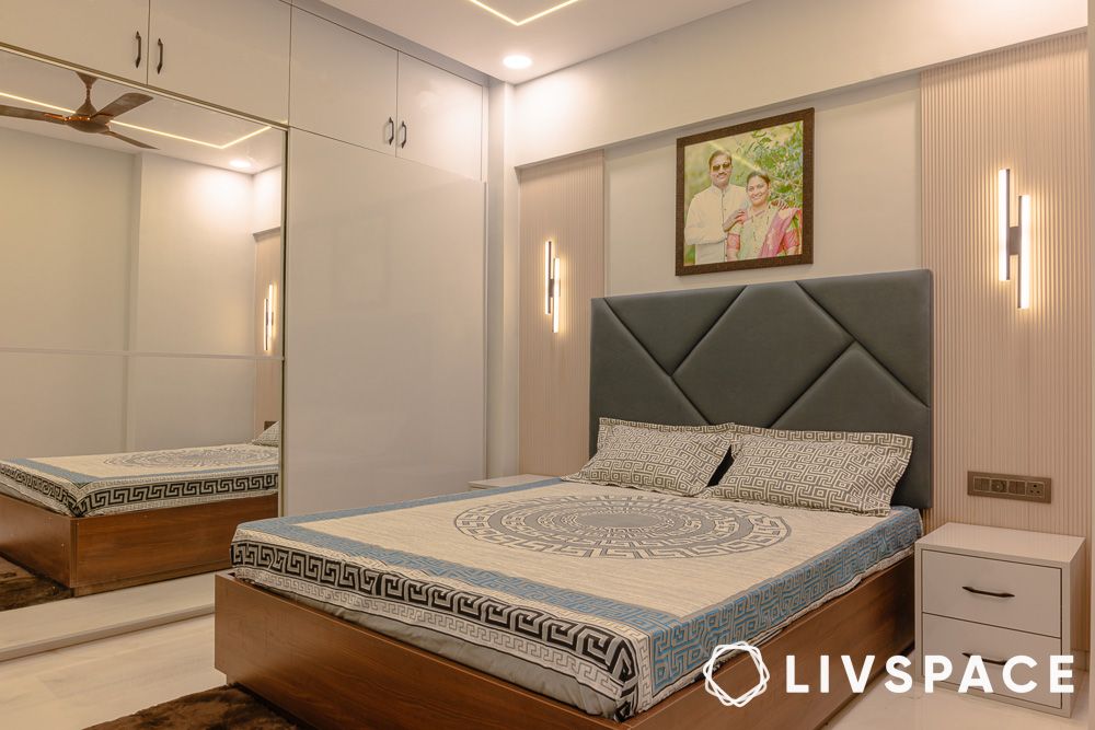 MASTER BEDROOM in grey black and cream colour combination with fluted wall panels