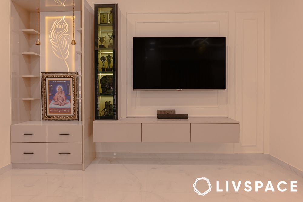 The minimal TV unit attached with pooja unit