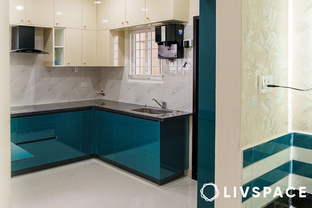 blue and cream coloured cabinets in kitchen