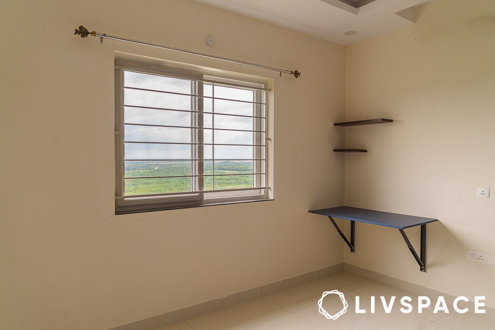 floating study table and shelves in the bedroom
