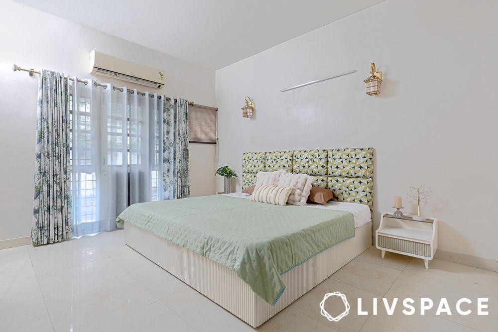 off white bedroom with pastel textiles