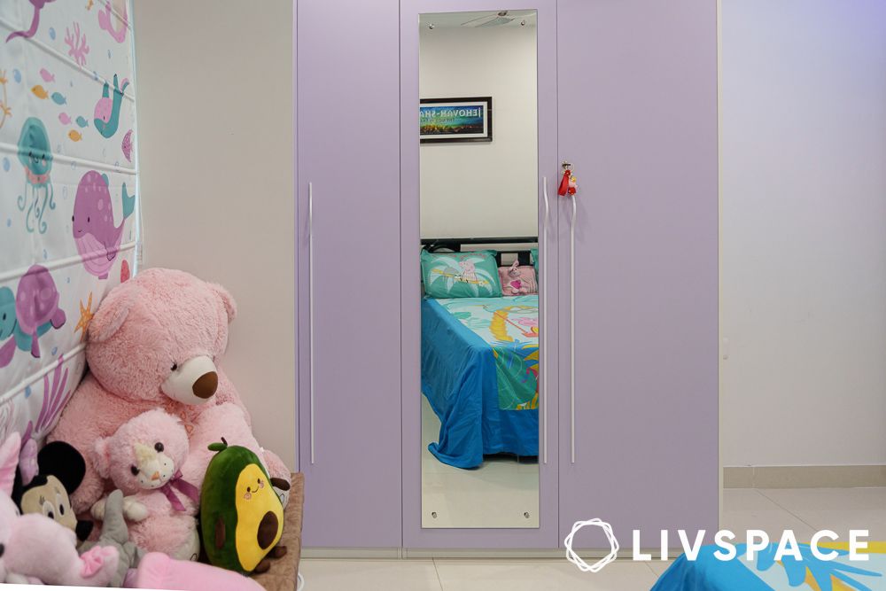 Double door lavender wardrobe in a kids bedroom