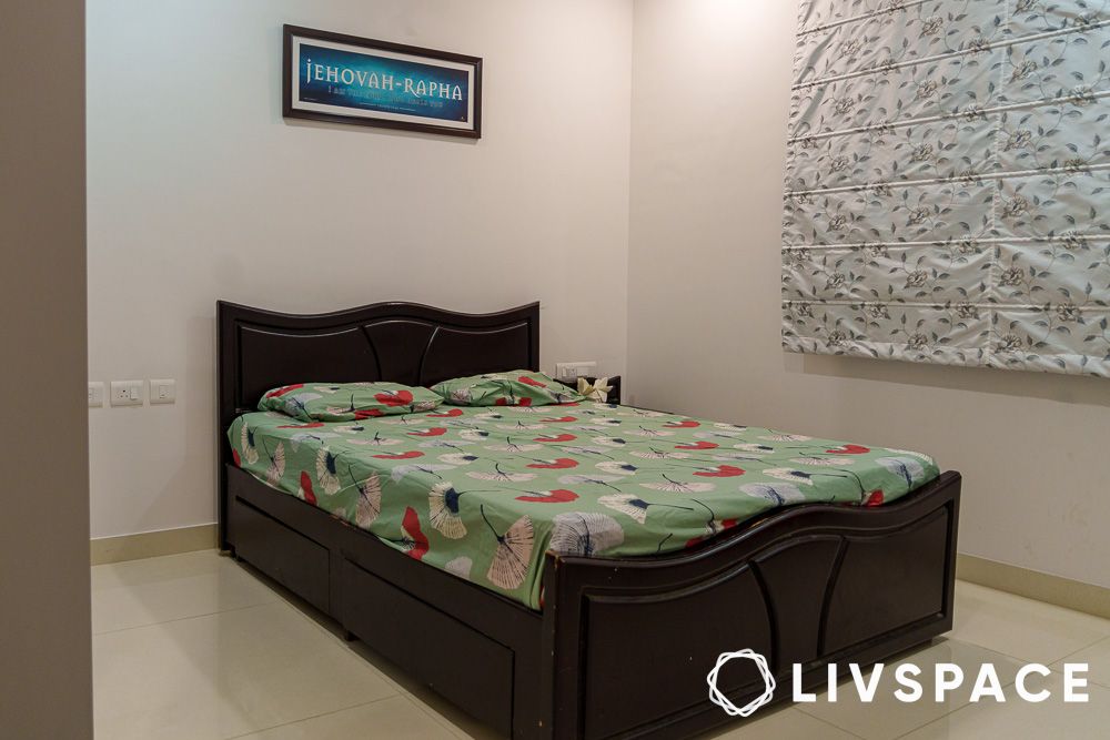 a minimal master bedroom design with beige walls