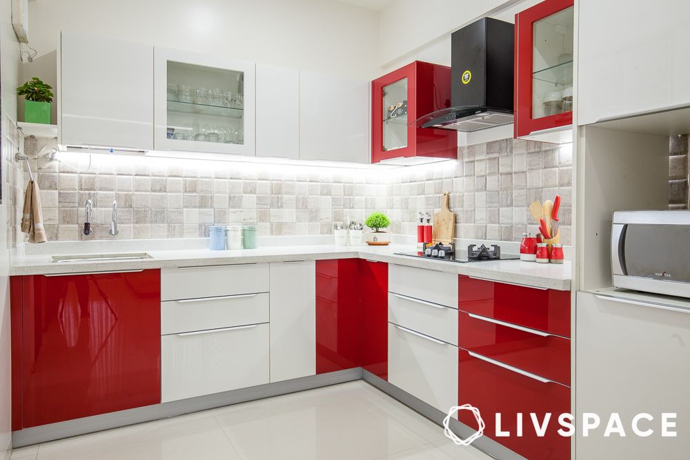 under cabinet lighting in white and red kitchen