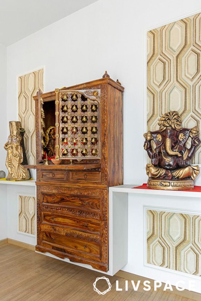 wooden pooja room door design with brass bells