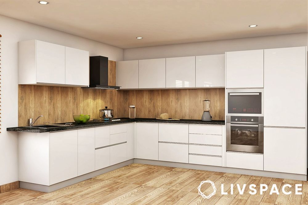 white cupboards and wood dado flooring in l shaped kitchen