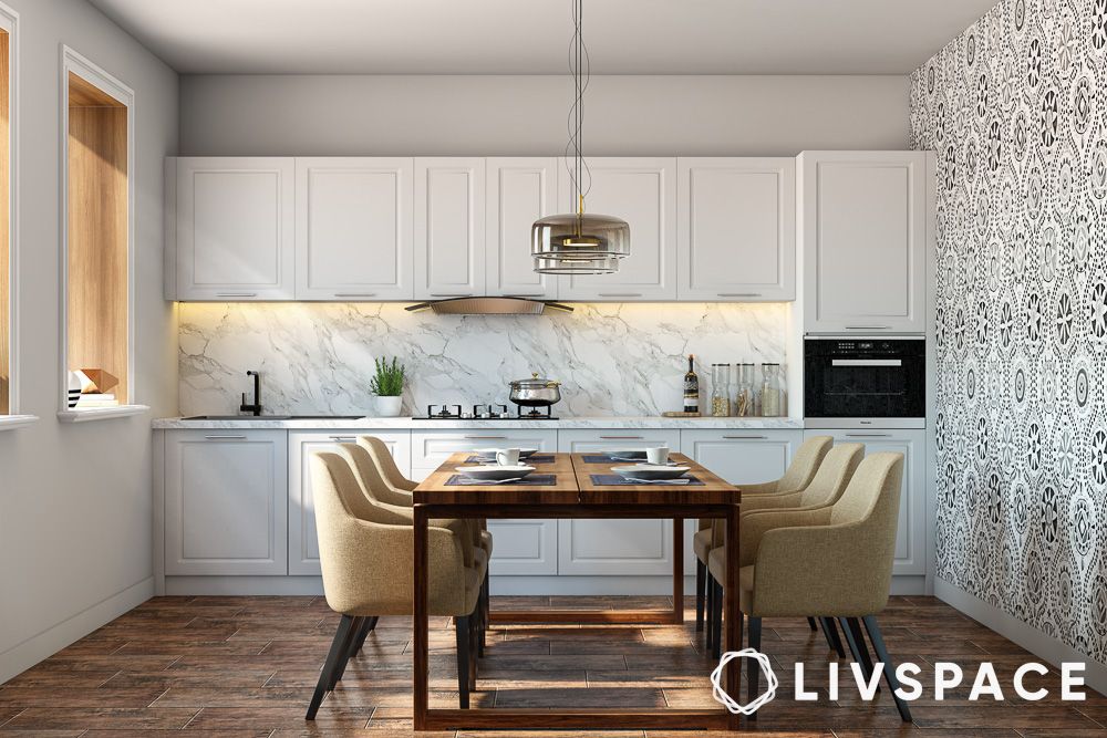modular kitchen in white colour with dining set