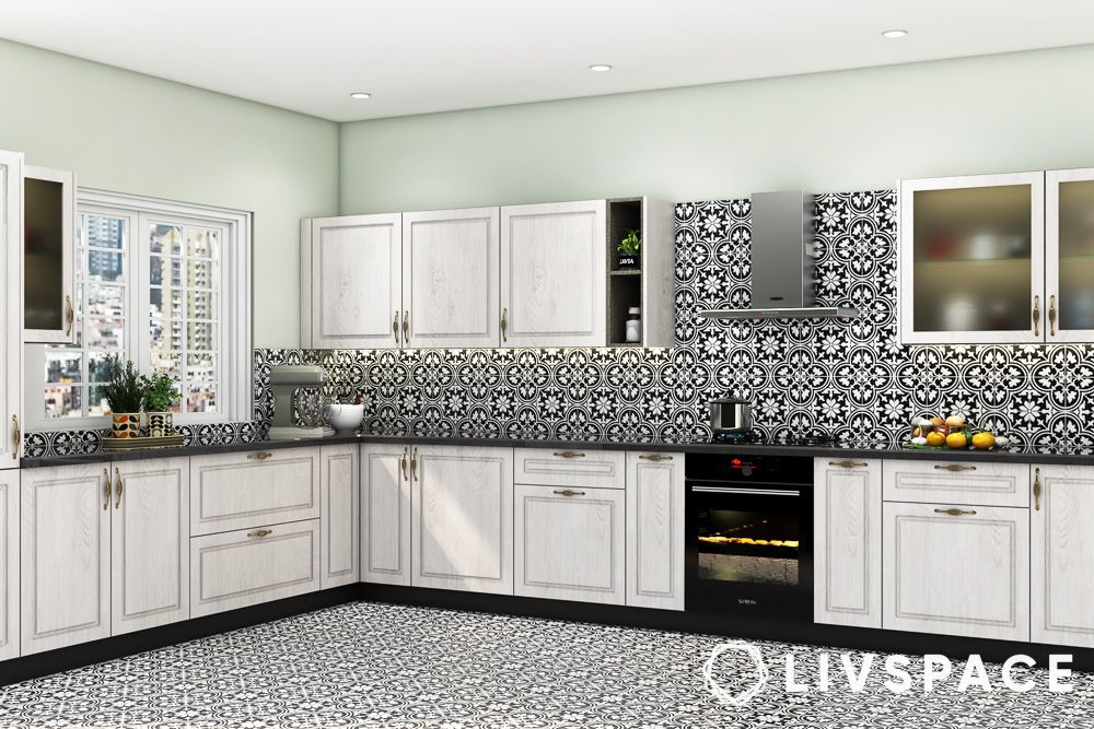 black and white modular kitchen with patterned flooring and backsplash