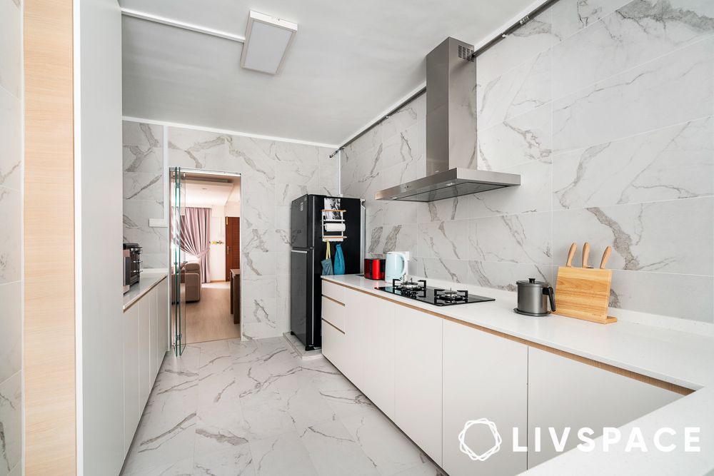 small l shaped all white kitchen