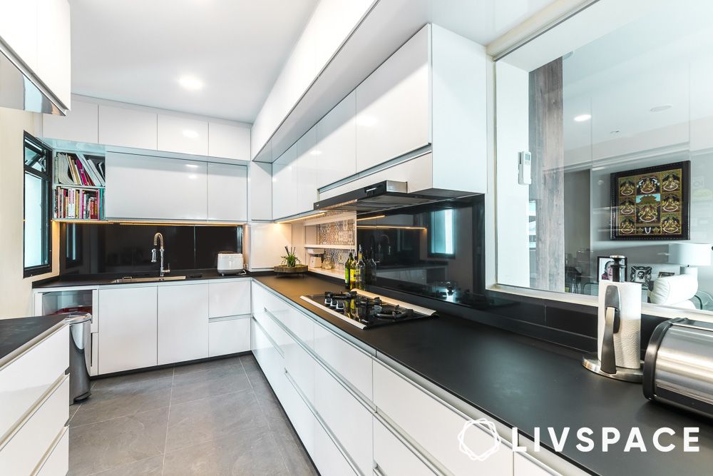 white cabinets with black countertop backsplash