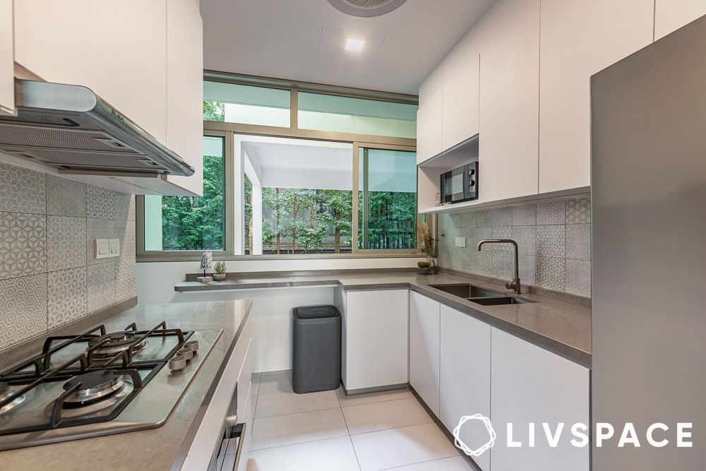 white u shaped kitchen design with view