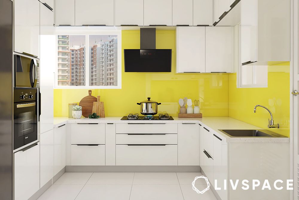 yellow and white kitchen in u shape