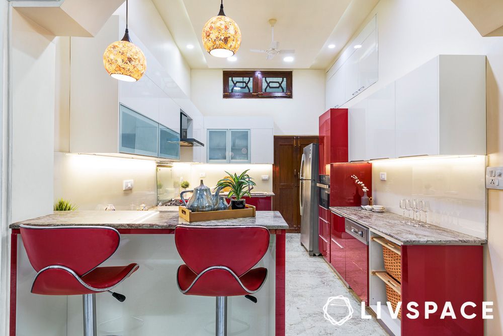 red and white kitchen cabinets with breakfast bar