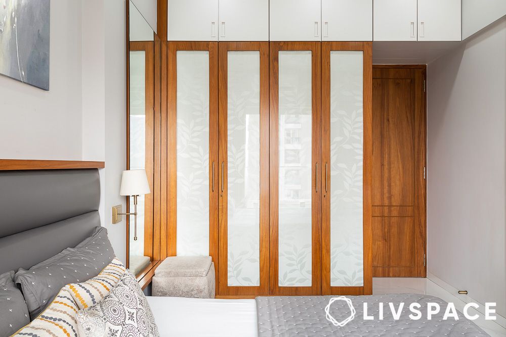 wooden and white floor to ceiling wardrobe