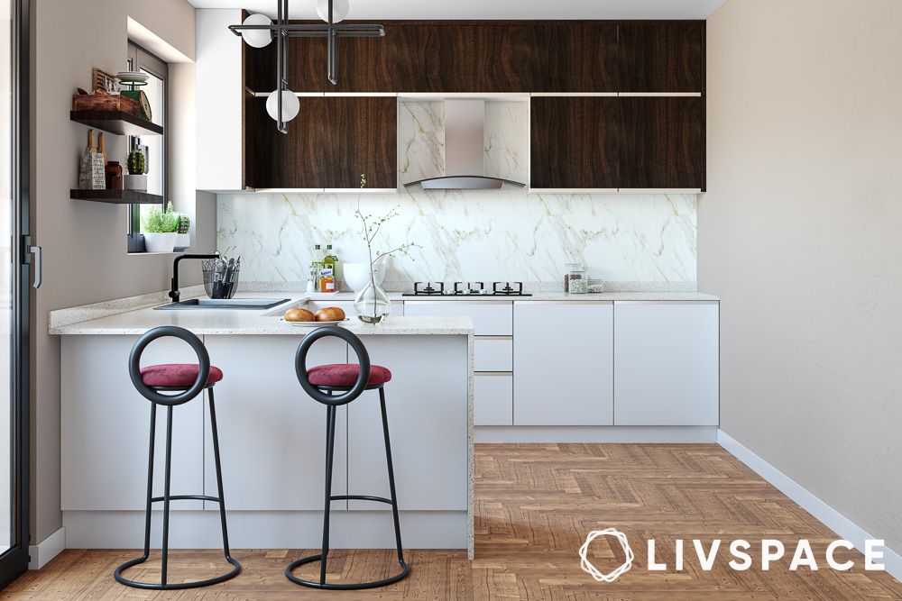 white kitchen with breakfast bar and wood upper cabinets