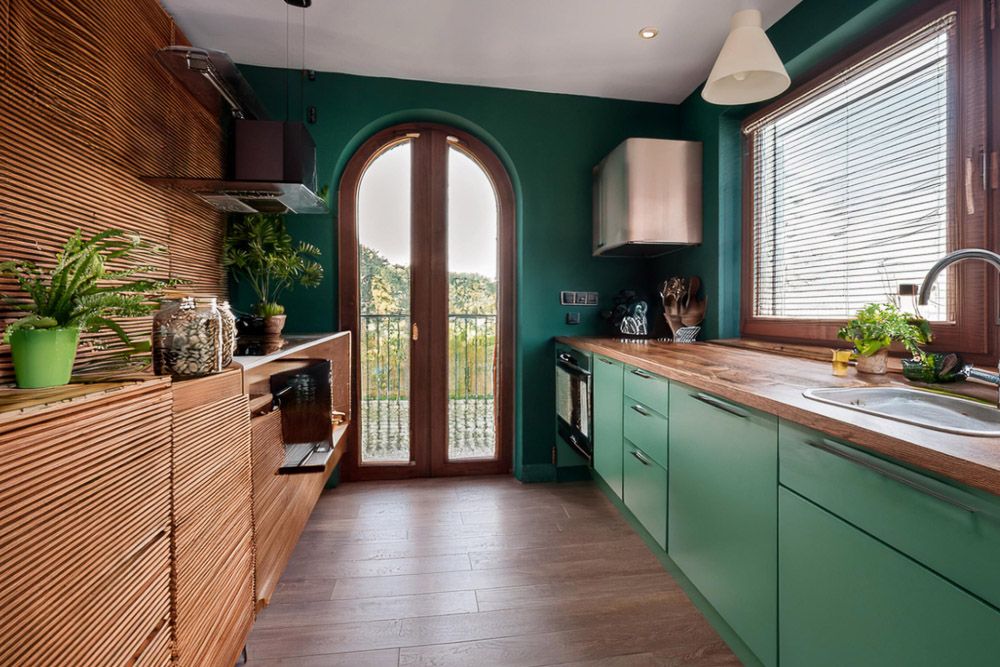 brown combination with peacock green in a kitchen