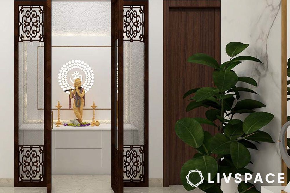 Textured wall pooja room mandir design with wooden carved doors